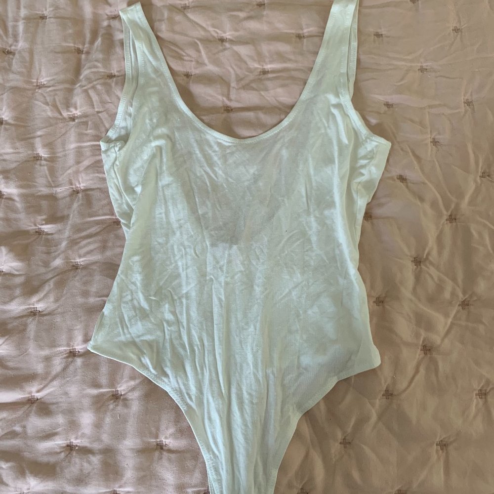NEVER WORN ROCK N RAGS WHITE BODYSUIT!